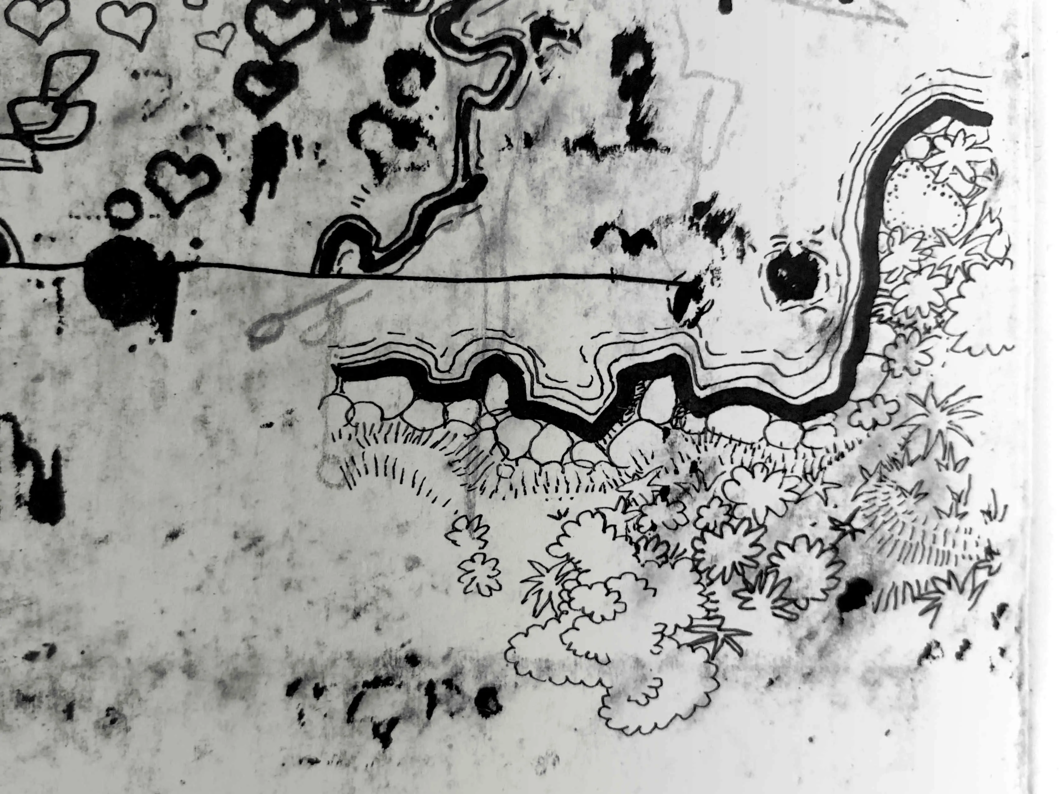 Rough doodles, smudges and map drawing in black in pen on smooth paper